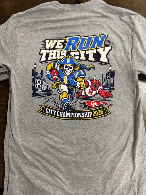 A gray school football championship T-shirt with a blue and yellow printed design.